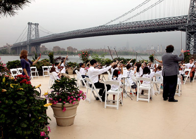 Students play at Giando on the Water in Brooklyn, NY - accompanied by the beautiful NYC skyline